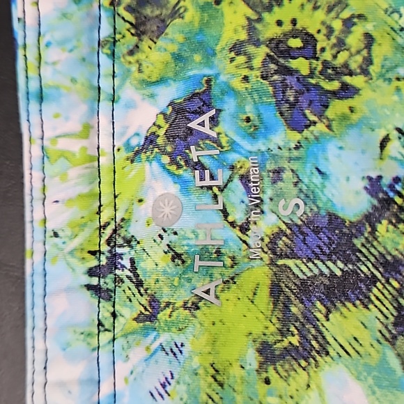 Athleta Pants - Athleta Athletic Shorts featuring vibrant colors w signature zipper on back.